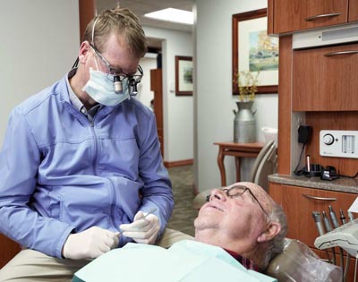 Dr. Gardner discussing a sedation plan with one of his patients to ensure a stress-free procedure